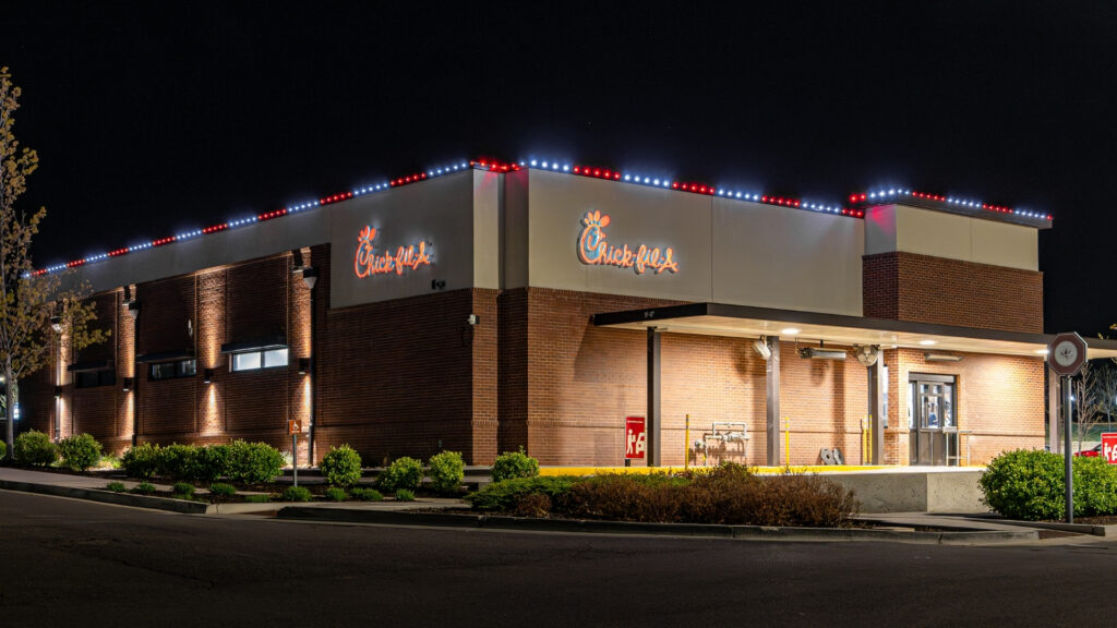 Permanent Trimlight holiday lighting installed on a commercial restaurant building